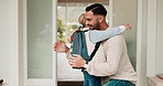 Dad, child and hug with bag for school, getting ready happy at family home door in morning. Smile, proud father and kid say goodbye with backpack, learning and development in love, support and pride.