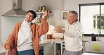 Senior couple, dancing and kitchen with love and marriage in home with music and care. Audio, house and elderly people together with romance and relax in retirement with happy partner and smile