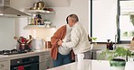 Old couple, hug in kitchen with coffee and love, morning routine and communication with trust in retirement. Commitment, marriage and life partner, man and woman at home, tea and chat with love