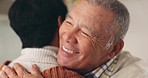 Senior couple, hug and closeup at home with love, marriage and retirement in lounge. Support, happy care and romance with smile and romantic embrace of a elderly man and woman relax together in house