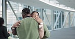 Hug, excited and a couple at the airport for a hello, love and welcome from a vacation. Together, happy and a young man and woman with care from a holiday flight, journey or reunion after travel