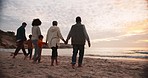 Family, back and holding hands at the beach in solidarity, support and trust, travel and adventure. Nature, behind and children, parents and grandparents at the ocean with freedom, love and journey