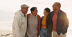 Couple, funny and elderly parents at beach for vacation, sea holiday or travel outdoor. Laughing, senior mother and father with adult man and woman bonding, smile and happy for family time at sunset