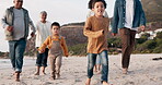 Happy, running and relax with big family at beach for travel, freedom and vacation. Happiness, smile and grandparents with parents and children on holiday for holding hands, playful and love