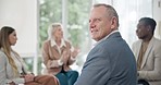 Happy man, group in therapy and business people in discussion with support, care and problem solving. Team building, men and women in circle for counselling, talking and listening for care in office.