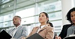 Convention, listening and business people in a row in the office at a corporate seminar. Notebook, conference and group of employees at a training workshop together in the modern workplace boardroom.