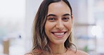 Face, happy and funny with a business woman in the office, laughing at a joke while feeling positive. Portrait, smile and humor with a young carefree female employee having fun in the workplace