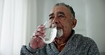 Home, health and senior man drinking water, wellness and thirsty with retirement, calm or relax. Hydration, pensioner or old person with liquid, fresh or enjoying cold drink for detox, energy or diet