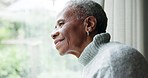 Senior woman, thinking and memory by window for ideas, smile or happy in retirement, morning or house. African elderly person, vision and mindfulness in nursing home, remember or reflection on choice