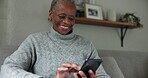 Elderly black woman, smartphone and laughing at chat, typing and communication with social media at home. Using phone, scroll app and internet search, funny text and relax on couch with retirement