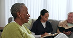 Senior black woman, bible and group in home, worship and prayer together. Elderly people, religion and study, spiritual praise and reading in knowledge, guide and community faith in retirement house
