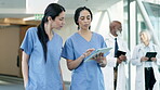 Teamwork, tablet or nurses talking about results in collaboration together in a hospital clinic. Women, healthcare or doctors reading online cardiology news report, medical feedback or research data