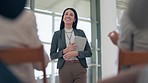 Tablet, applause and a business woman giving a presentation in the boardroom for training or coaching. Technology, smile and a female speaker talking to an audience during a seminar or workshop