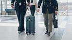 Luggage, airport and pilot travel together with bag for flight, schedule or international transportation job. Men, suitcase and global team for walking, airplane and boarding for commercial flying