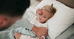 Sad, sick or tired and a girl in bed with her dad in the morning for care or concern for her health. Family, children and a man looking after his ill daughter in the bedroom of their home closeup