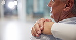 Holding hands, support or old man in wheelchair with nurse for healthcare services or wellness in hospital. Closeup, doctor or elderly patient with a disability in consultation with empathy or trust