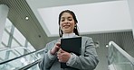 Escalator, business woman and tablet with coffee in lobby for international travel to work in low angle. Tech, happy consultant and professional on stairs at airport, convention centre or conference