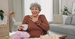 Funny, tea and senior woman with friends in home living room, bonding and talking at table. Happy people, elderly person and laughing at comedy, joke and smile for conversation, gossip and coffee