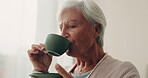 Relax, tea and a senior woman drinking from a cup in the living room of her nursing home during retirement. Face, smile or peace and an elderly female pensioner feeling carefree with a beverage