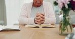 Senior woman, bible and prayer with faith, holy worship and peace with religion, home and hope. Elderly lady, Christianity or old female person with scripture, support and pray for guidance and peace