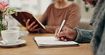 Hands writing, old people and bible in home for faith, religion or God with notes for worship in notebook. Studying closeup, holy books or Christian friends learning literature or spiritual prayer