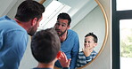 Hair, bathroom mirror and a father and child at home for hairstyle, imitate or self care. A happy man and a boy kid together in a family house for grooming, hygiene or happiness motivation in morning