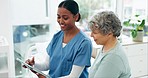 Nurse speaking to a senior patient in the clinic during a medical wellness consultation. Healthcare, checkup and sick elderly female person talking to a young woman doctor in a medicare hospital.