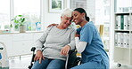 Healthcare, black woman nurse hugging a senior patient in a wheelchair and support in a hospital. Medical, trust and a medicine professional in a clinic with a mature female person with a disability