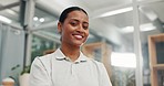 Happy, smile and face of a female physiotherapist standing with confidence in her office in clinic. Happiness, excited and portrait of professional Indian woman healthcare worker in medical hospital.