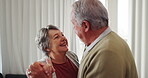 Dance, love and a senior couple in their home for playful romance together during retirement. Smile, relax or funny with a happy elderly man and carefree woman moving to music in the living room