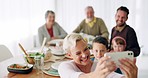 Selfie, family smile and dinner with kids, parents and grandparents together with fun. Dining room, food and bonding with children, mother and dad at thanksgiving event with picture for social media