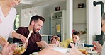 Happy, eating and big family with lunch in a house, food together and talking in dining room. Smile, brunch and a laughing senior mother, man and children with breakfast, conversation and a buffet