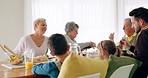 Breakfast, happy and family at dinner table for eating together, social gathering and lunch at home. Talking, morning and grandparents, parents and children bonding with meal, food and nutrition