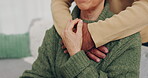 Couple, love and hug for empathy and support or security on home sofa. Closeup of man and woman together in living room for trust, compassion and help or touch for kindness with care in retirement