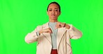 Green screen, frown and woman face with thumbs down in studio for wrong, no or rejection on mockup background. Portrait, sad and lady model with emoji hands for fail, bad or reaction to fake news