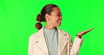 Green screen, studio and happy woman face with hand holding space for promo, info or giveaway on mockup background. Happy, portrait and female model show news, review or feedback, deal or giveaway