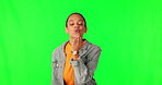Green screen, blowing air kiss and a young woman on a studio background. Portrait of a gen z student person with fashion and smile for flirting, kissing or love emoji with hands on valentines day