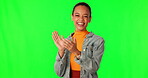 Excited, winner and woman clapping on green screen to celebrate success on studio background. Happy person portrait with applause emoji for thank you, motivation and congratulations for achievement
