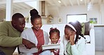 Parents playing a game on a tablet with their children in the living room for bonding together. Happy, love and African family browsing on social media or the internet with digital technology at home