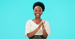 Face, woman and applause in studio for success, fist celebration or cheers on blue background. Portrait, happy african model and clapping to celebrate winning, bonus or congratulations of achievement