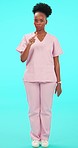 Black woman, face and nurse with stop hands in studio with no, protest or healthcare advice warning on blue background. Medical, wrong and African lady portrait of doctor with finger, vote or stop