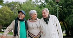 Nature, talking and senior friends walking in an outdoor park for fresh air and exercise. Happy, smile and elderly people in conversation while bonding, having fun and exploring green garden together