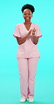 Smile, support and applause with a nurse black woman on blue background in studio for healthcare. Portrait, medical and goals with a happy young female medicine professional clapping in scrubs