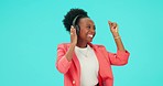 Music, dancing and black woman with headphones to listen in studio isolated on a blue background mockup space. Radio, streaming and happy person hearing podcast, sound or audio for moving with energy