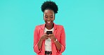 Phone, message and happy black woman in studio texting, laugh or social media chat on blue background. Smartphone, app and African lady online for meme, post or funny, joke or silly gif communication