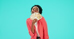 Money, fan and black woman with cash in hand in studio, blue background and winning, prize and rich investor. Finance, investment or dollars from lottery or businesswoman with a profit or bonus