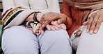 Senior friends, park care and holding hands with support, comfort and hope outdoor. Bench garden sitting and mature people with retirement, empathy and kindness gesture for friendship and trust