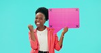 Black woman, speech bubble and winning fist in studio excited for news, deal or competition prize on blue background. Hands, portrait and African female winner with social media, banner or sign up