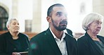 Sad, man and thinking at a funeral in church listening to religious service and mourning. Grief, male person and burial with death, ceremony and grieving of chapel event of family member or friend