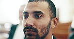 Sad, man and face closeup with depression at a funeral in church for religious service and mourning. Grief, male person and burial with death, ceremony and grieving loss at chapel event in a suit